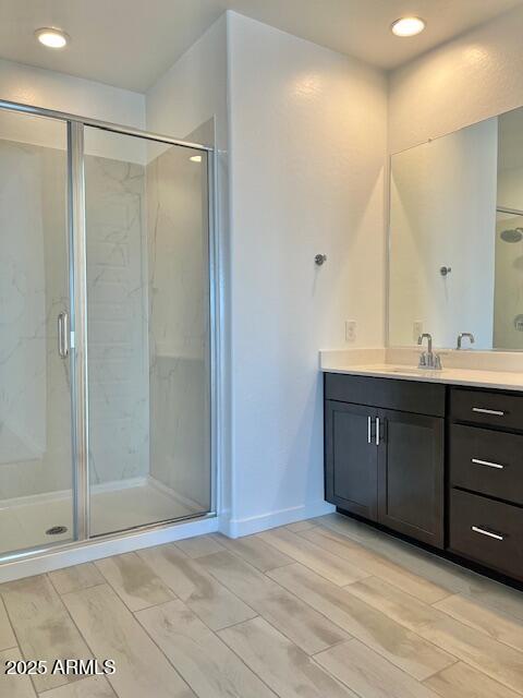 3341 South Lotus Mesa, AZ 85212 - Photo 27 of 42 a bathroom with a shower sink and mirror