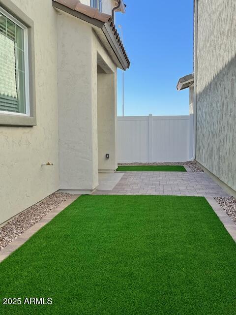 3341 South Lotus Mesa, AZ 85212 - Photo 37 of 42 a view of backyard with a barn and a cactus plant