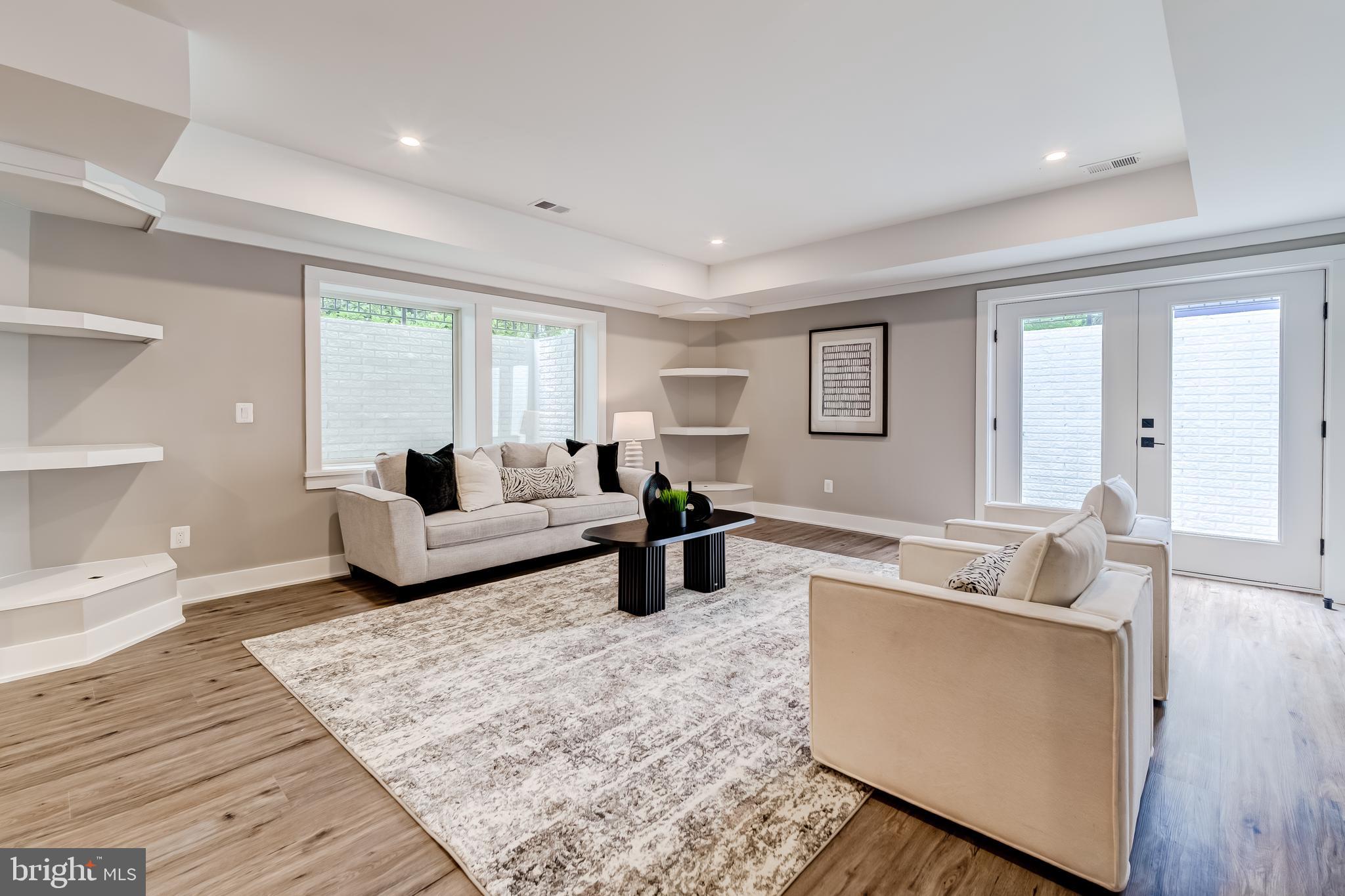 506 Kingsley Road Southwest Vienna, VA 22180 - Photo 125 of 150 a living room with furniture and wooden floor