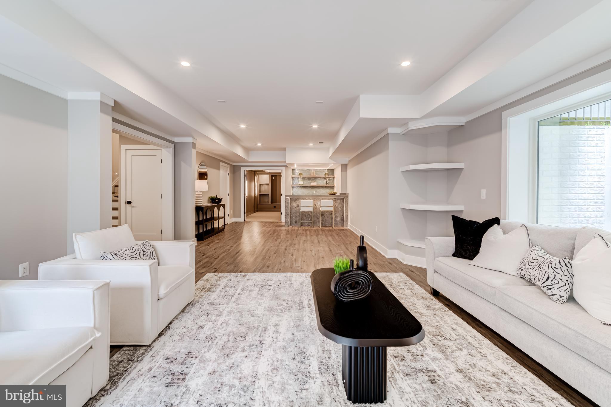 506 Kingsley Road Southwest Vienna, VA 22180 - Photo 129 of 150 a living room with furniture and a fireplace