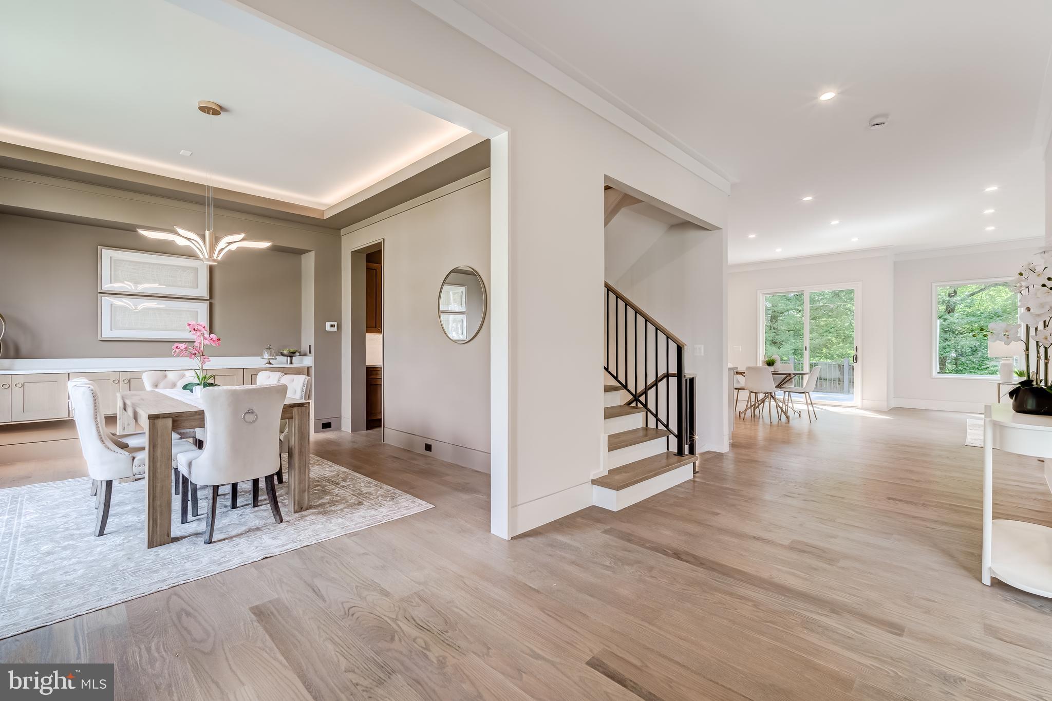 506 Kingsley Road Southwest Vienna, VA 22180 - Photo 20 of 150 a view of a dining room with furniture and wooden floor