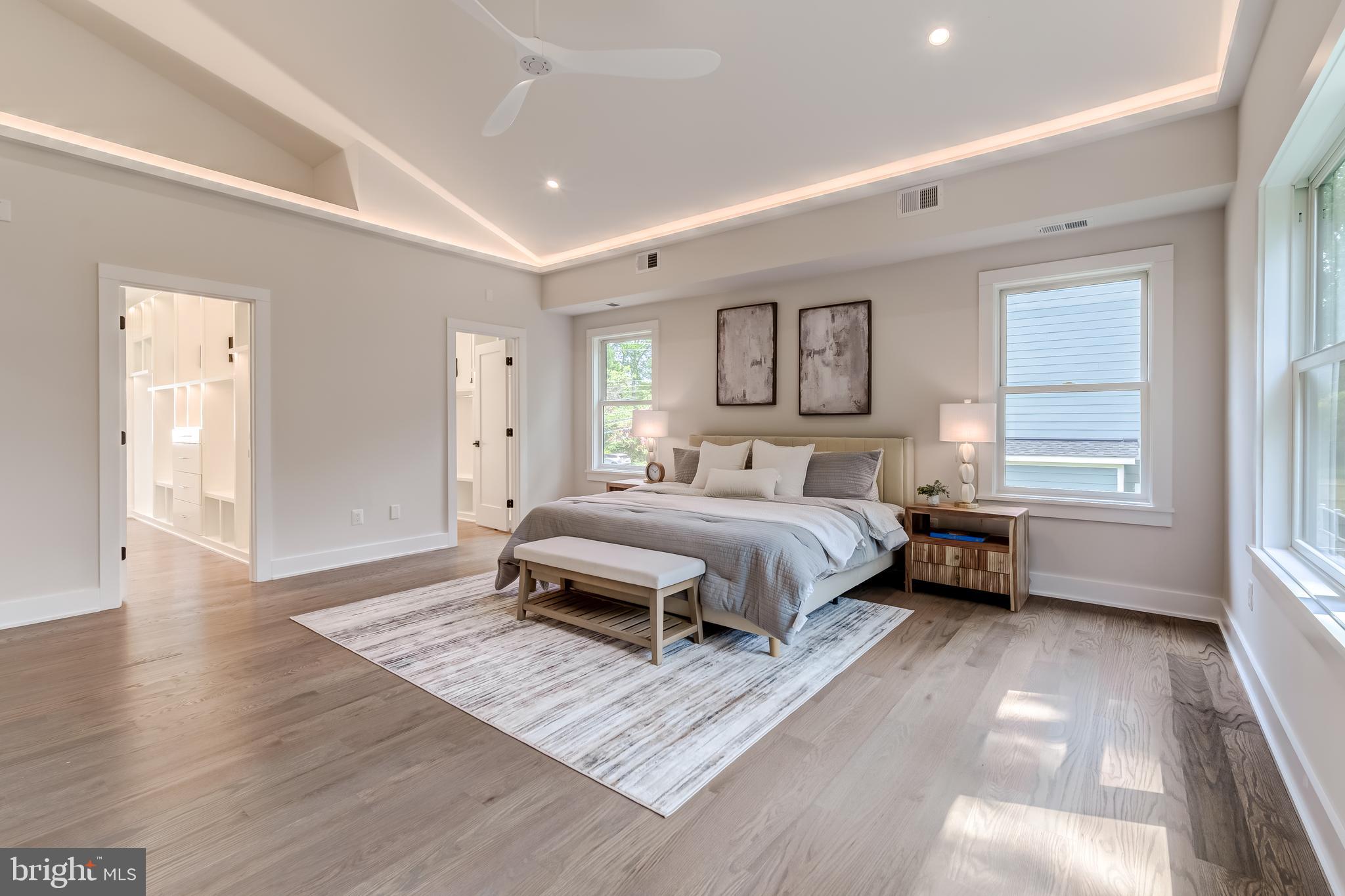 506 Kingsley Road Southwest Vienna, VA 22180 - Photo 84 of 150 a bedroom with a bed wooden floor and a window