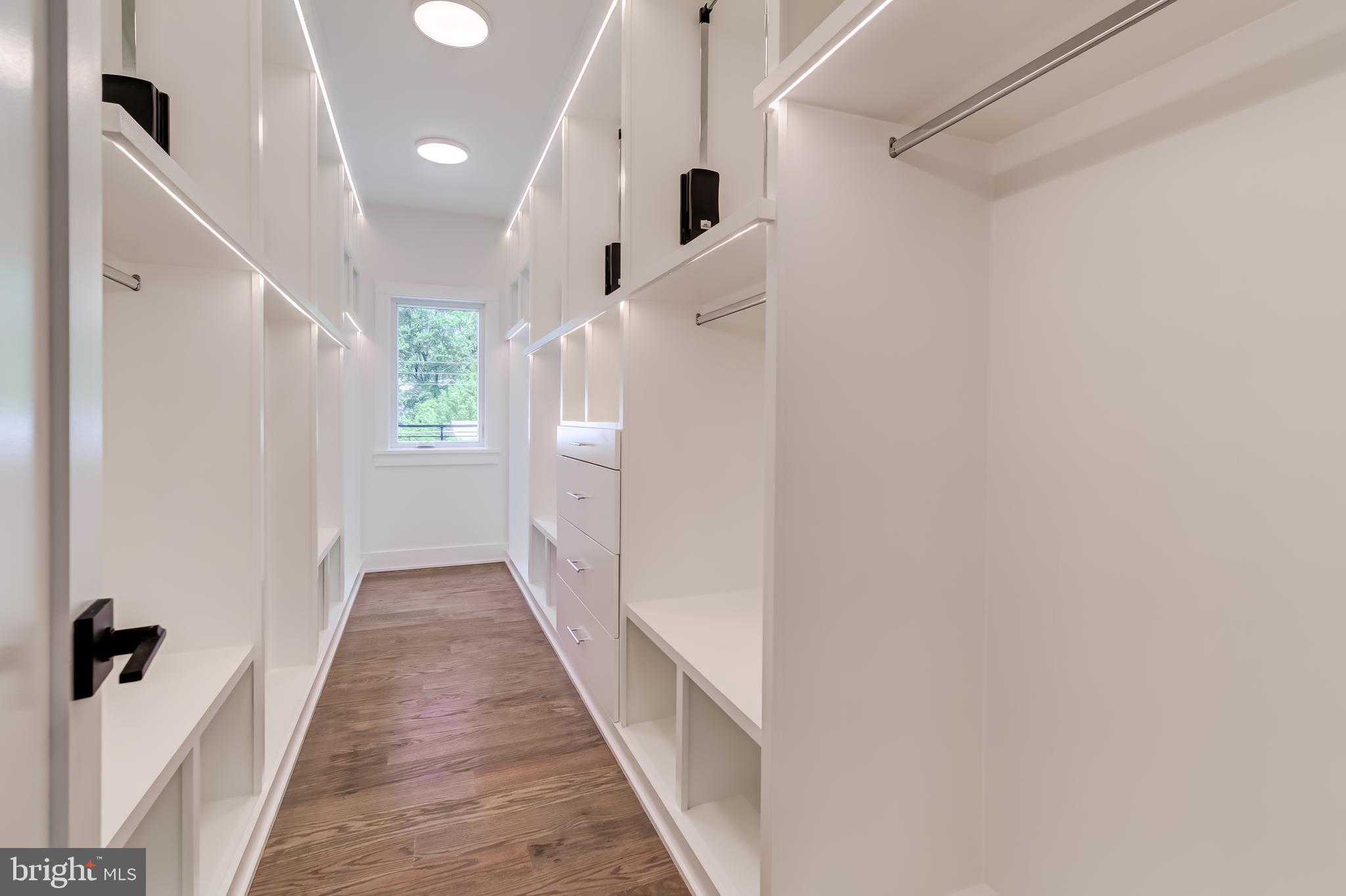506 Kingsley Road Southwest Vienna, VA 22180 - Photo 89 of 150 a view of a hallway with wooden floor and staircase