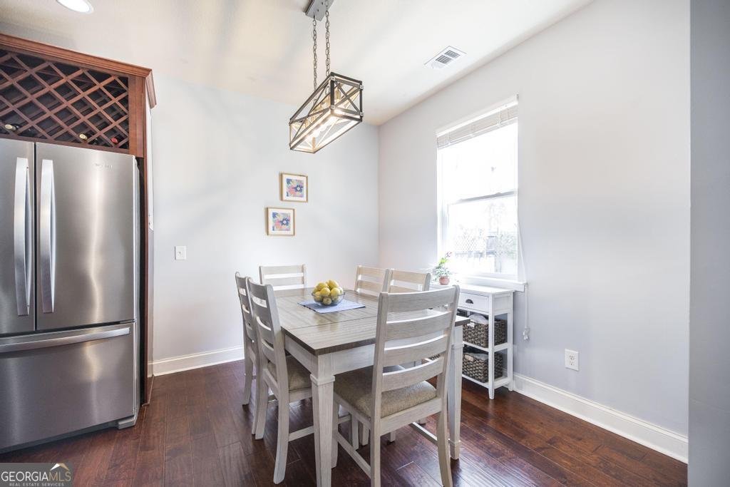 400 Ansley Avenue Perry, GA 31069 - Photo 12 of 37 a view of a dining room with a table and chairs