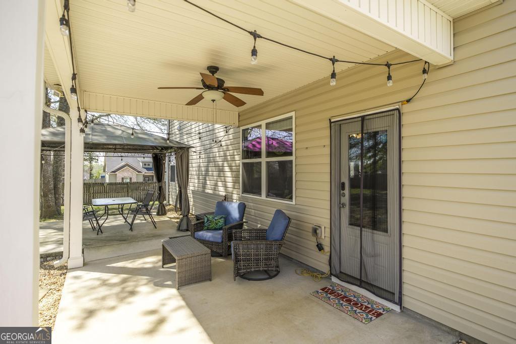 400 Ansley Avenue Perry, GA 31069 - Photo 31 of 37 a view of a patio with table and chairs