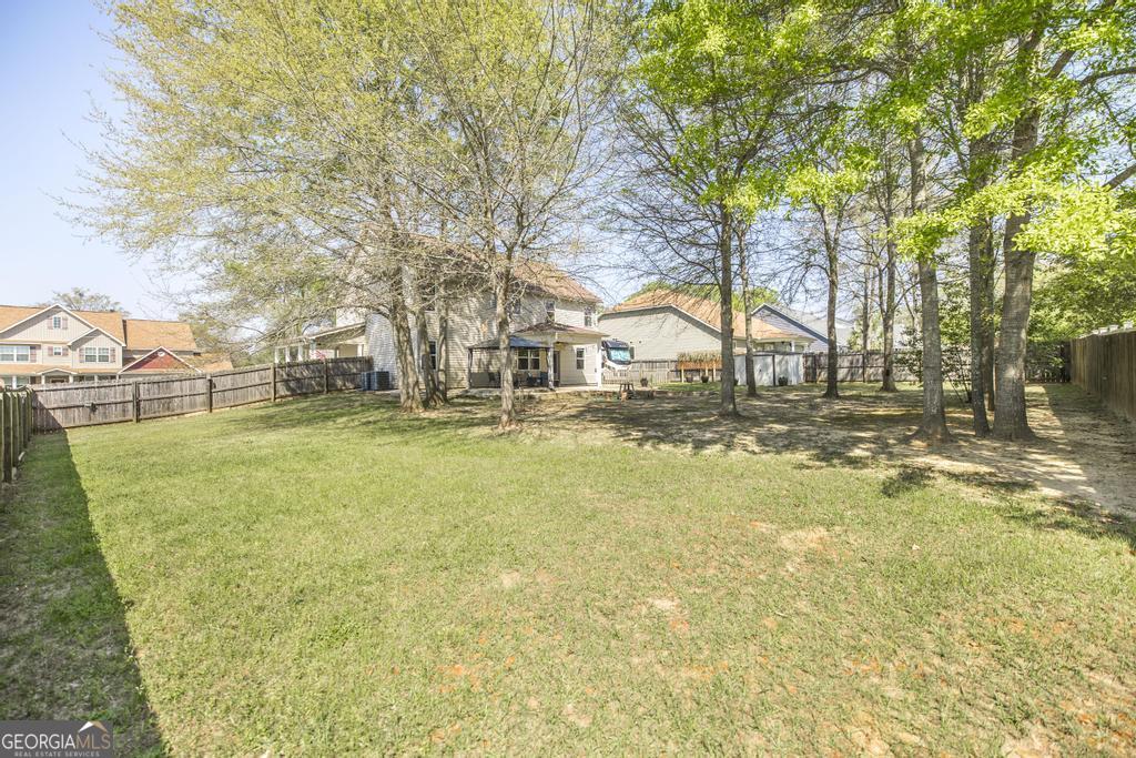 400 Ansley Avenue Perry, GA 31069 - Photo 36 of 37 a view of yard with swimming pool