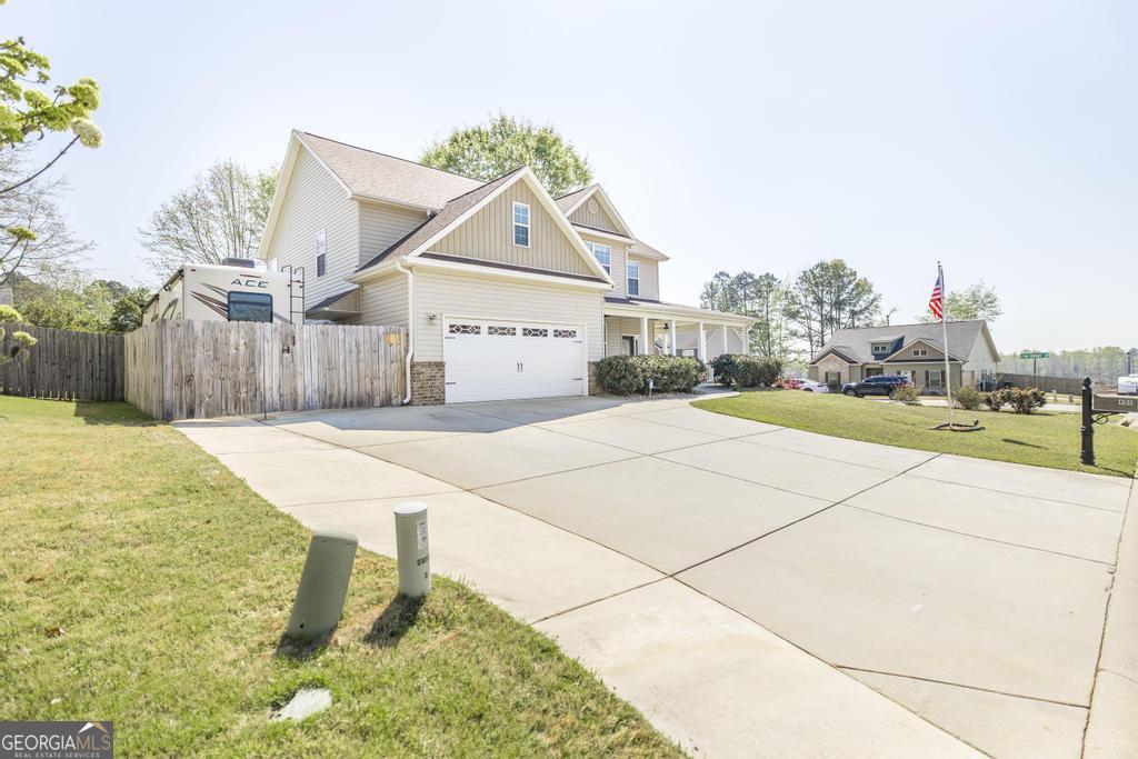 400 Ansley Avenue Perry, GA 31069 - Photo 4 of 37 a house with view of outdoor space