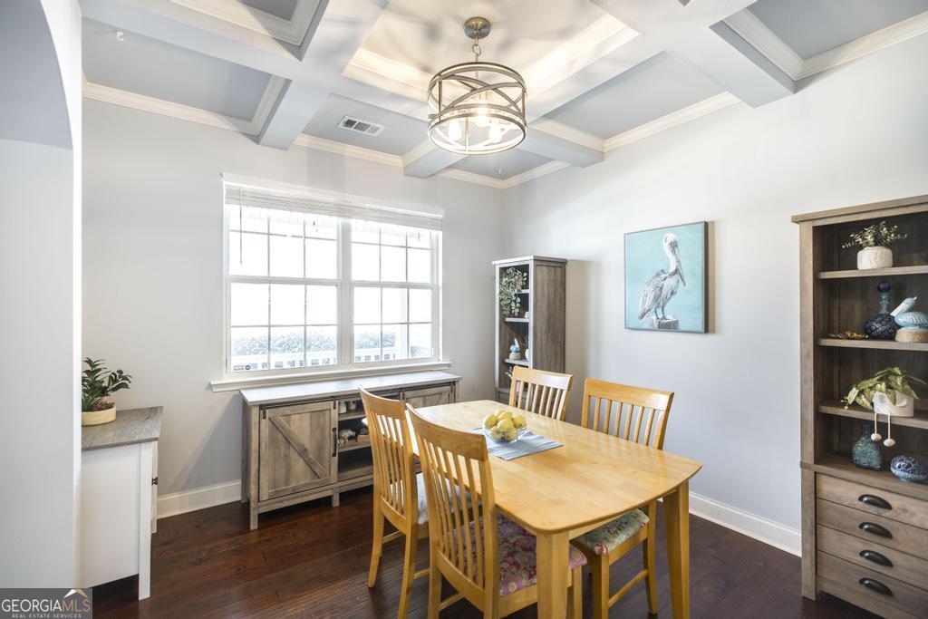 400 Ansley Avenue Perry, GA 31069 - Photo 8 of 37 a view of a dining room with furniture window and wooden floor