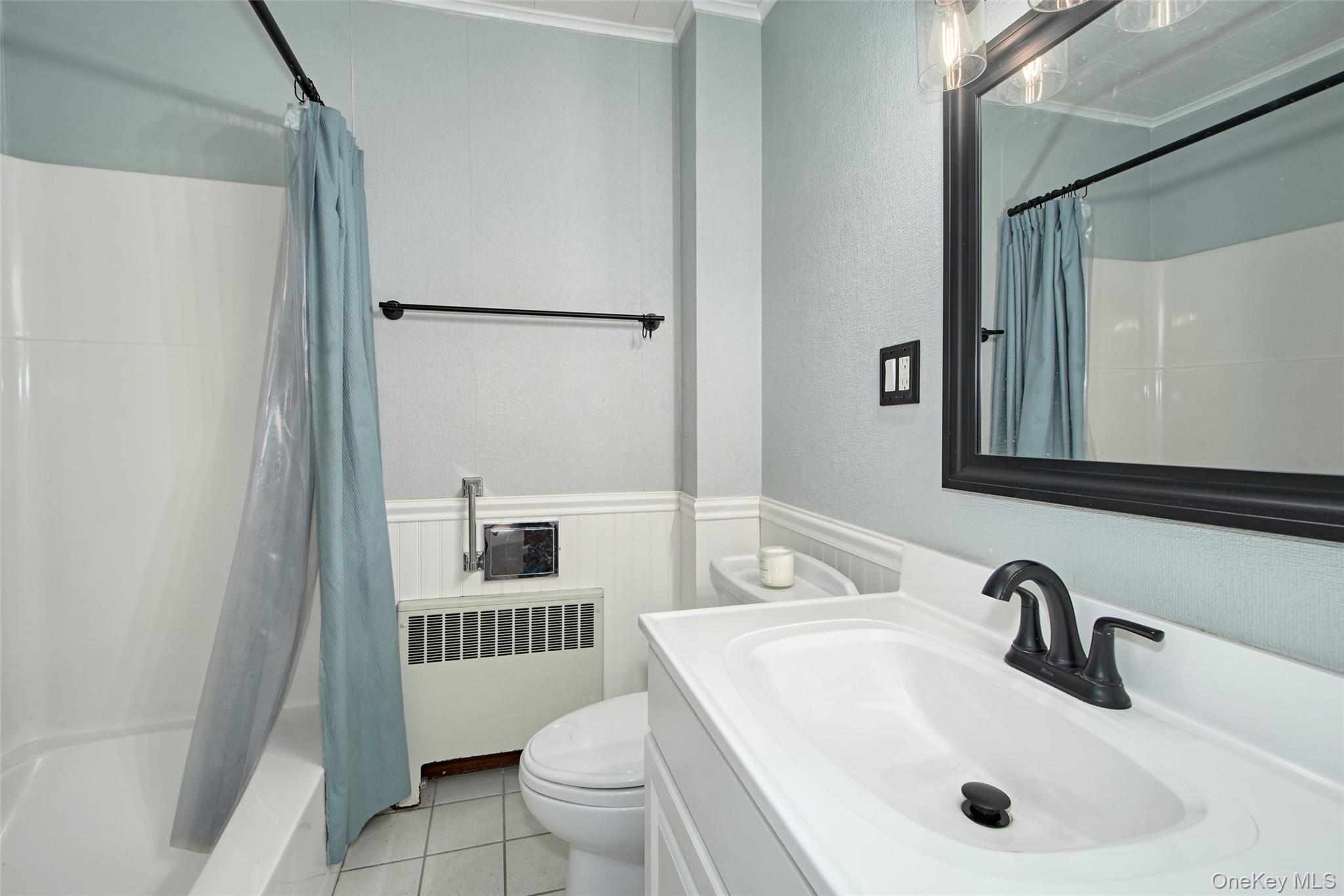 22 Ridgeland Terrace Rye, NY 10580 - Photo 14 of 19 a bathroom with a sink toilet and shower