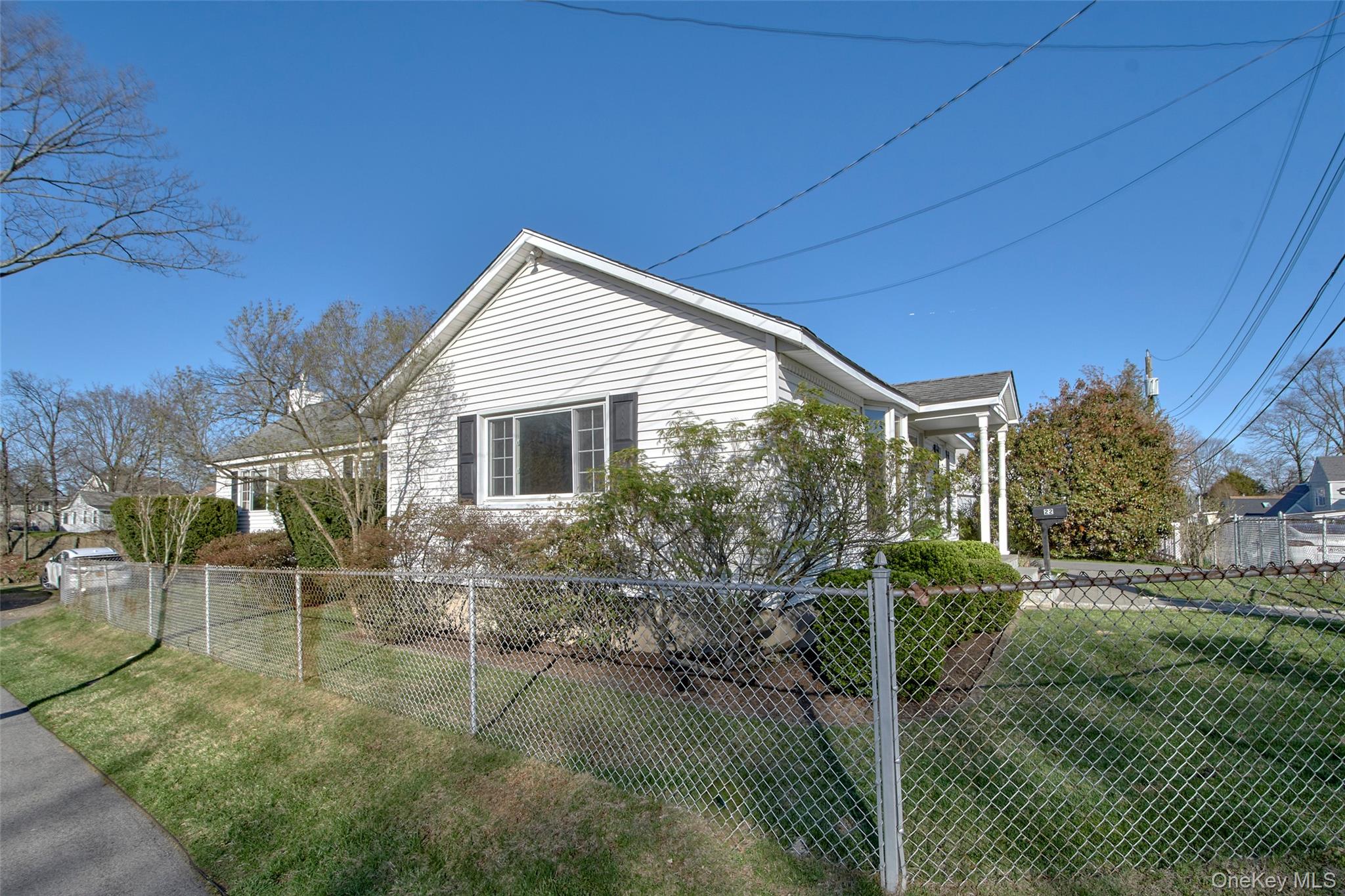 22 Ridgeland Terrace Rye, NY 10580 - Photo 5 of 19 a front view of house with yard and green space