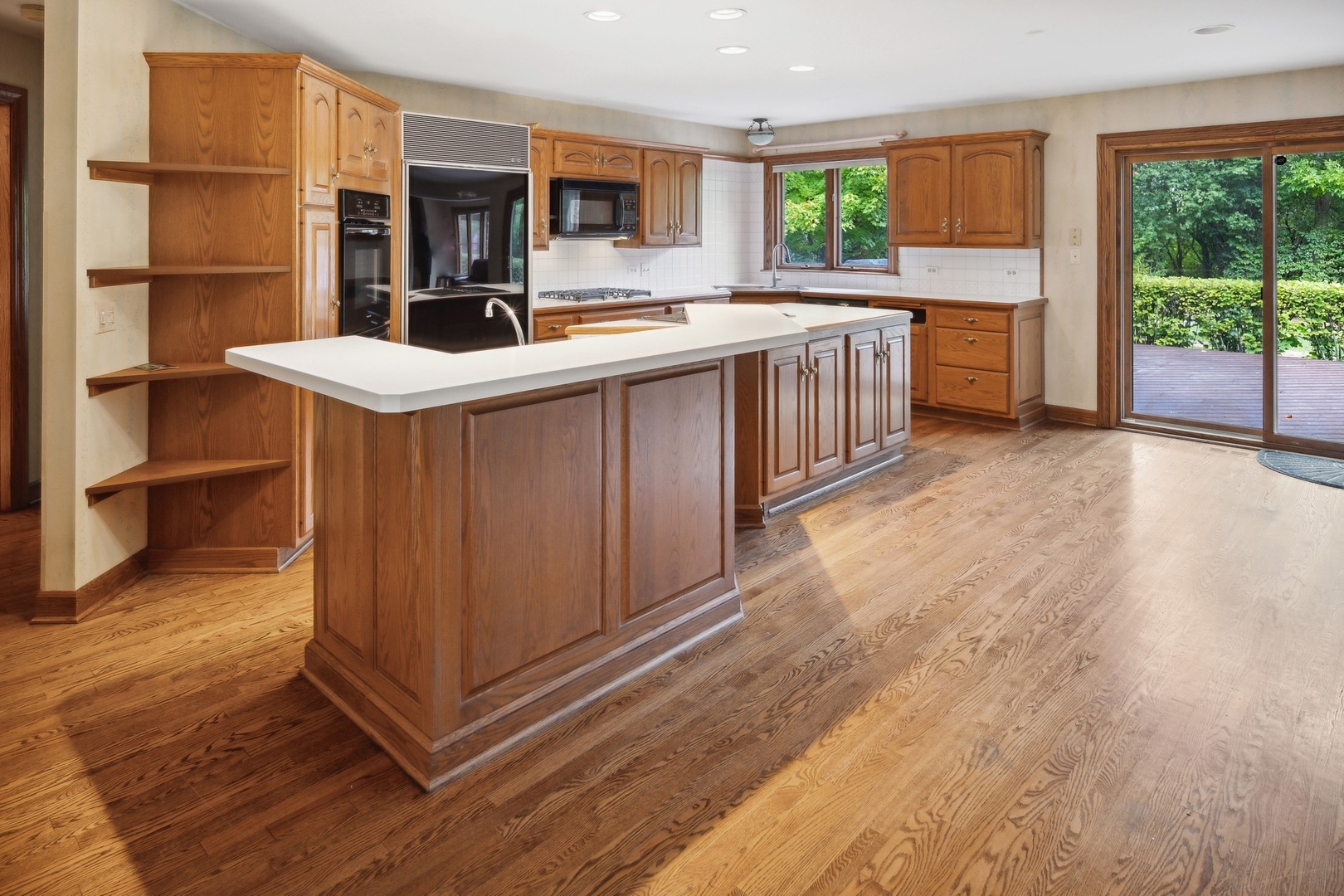 989 South Ridge Road Lake Forest, IL 60045 - Photo 17 of 36 a kitchen with a sink stove and cabinets