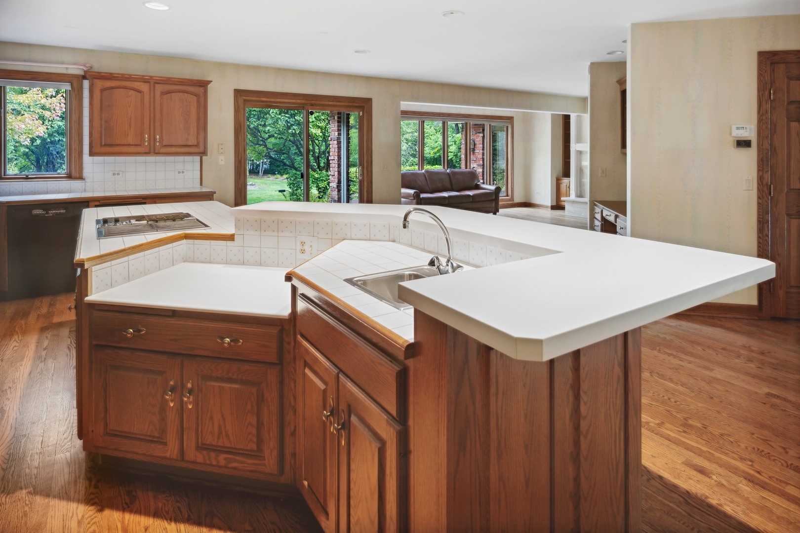 989 South Ridge Road Lake Forest, IL 60045 - Photo 18 of 36 a kitchen with a sink a window and cabinets