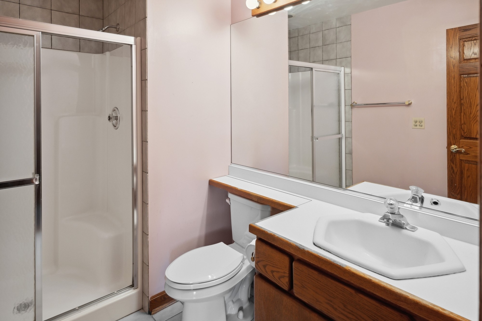 989 South Ridge Road Lake Forest, IL 60045 - Photo 27 of 36 a bathroom with a sink toilet and shower
