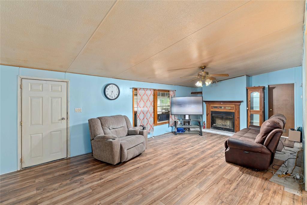 210 7th Street Blanket, TX 76432 - Photo 8 of 33 a living room with furniture rug and fireplace