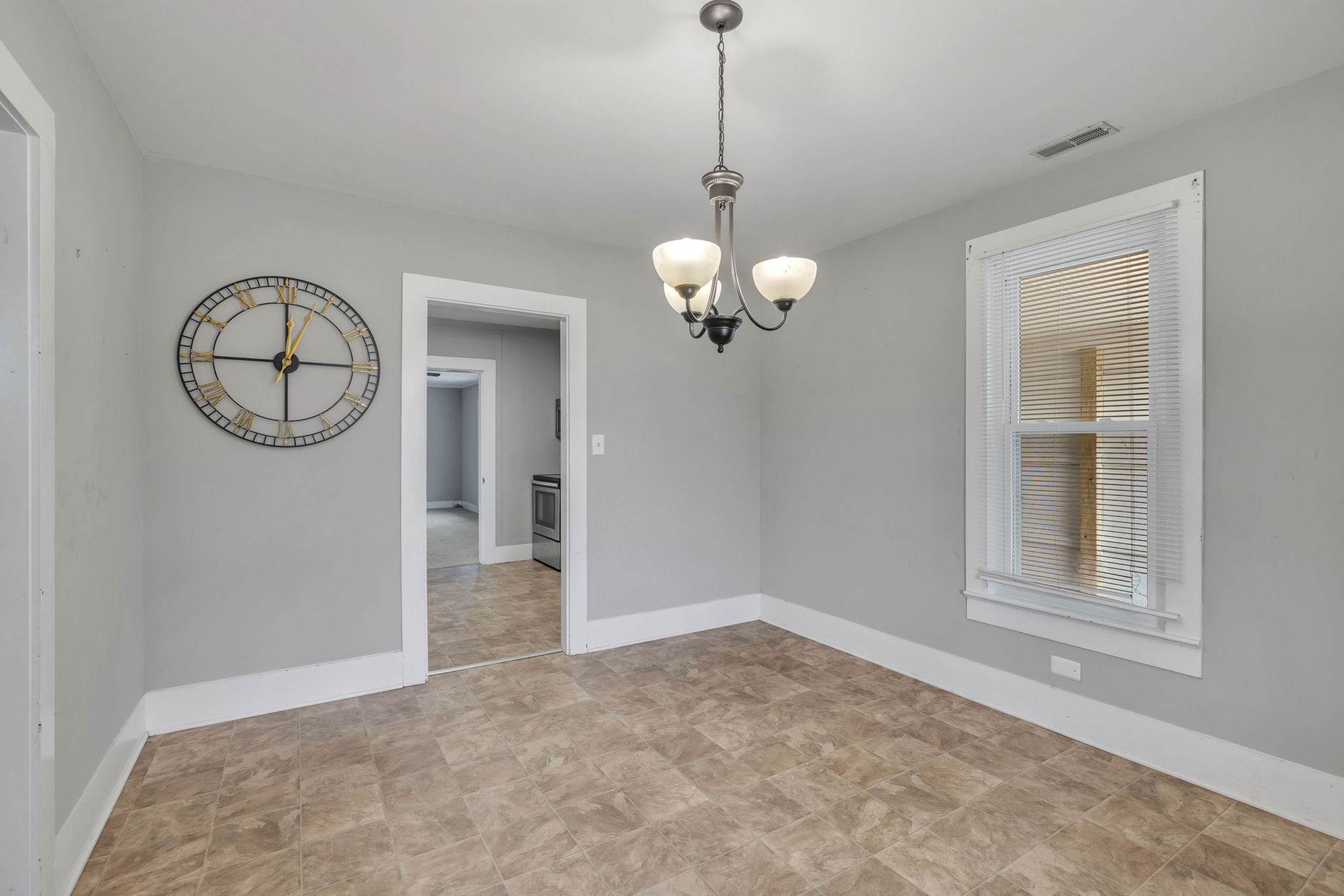 301 Maple Street Chapel Hill, TN 37034 - Photo 15 of 38 a view of a room with wooden floor and chandelier