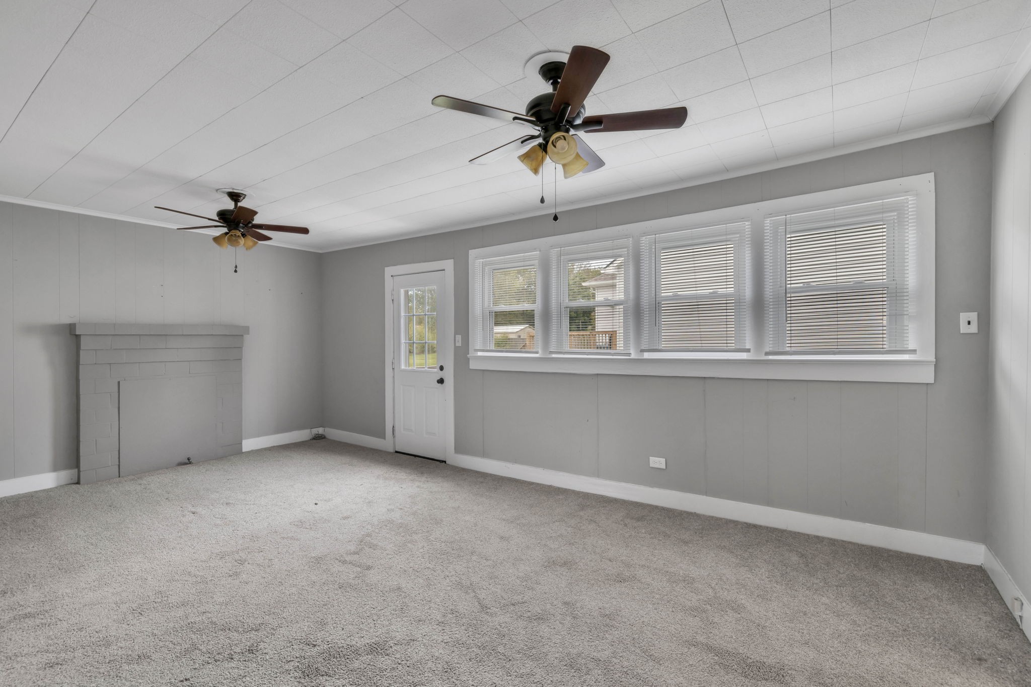 301 Maple Street Chapel Hill, TN 37034 - Photo 23 of 38 a view of an empty room with a ceiling fan and window