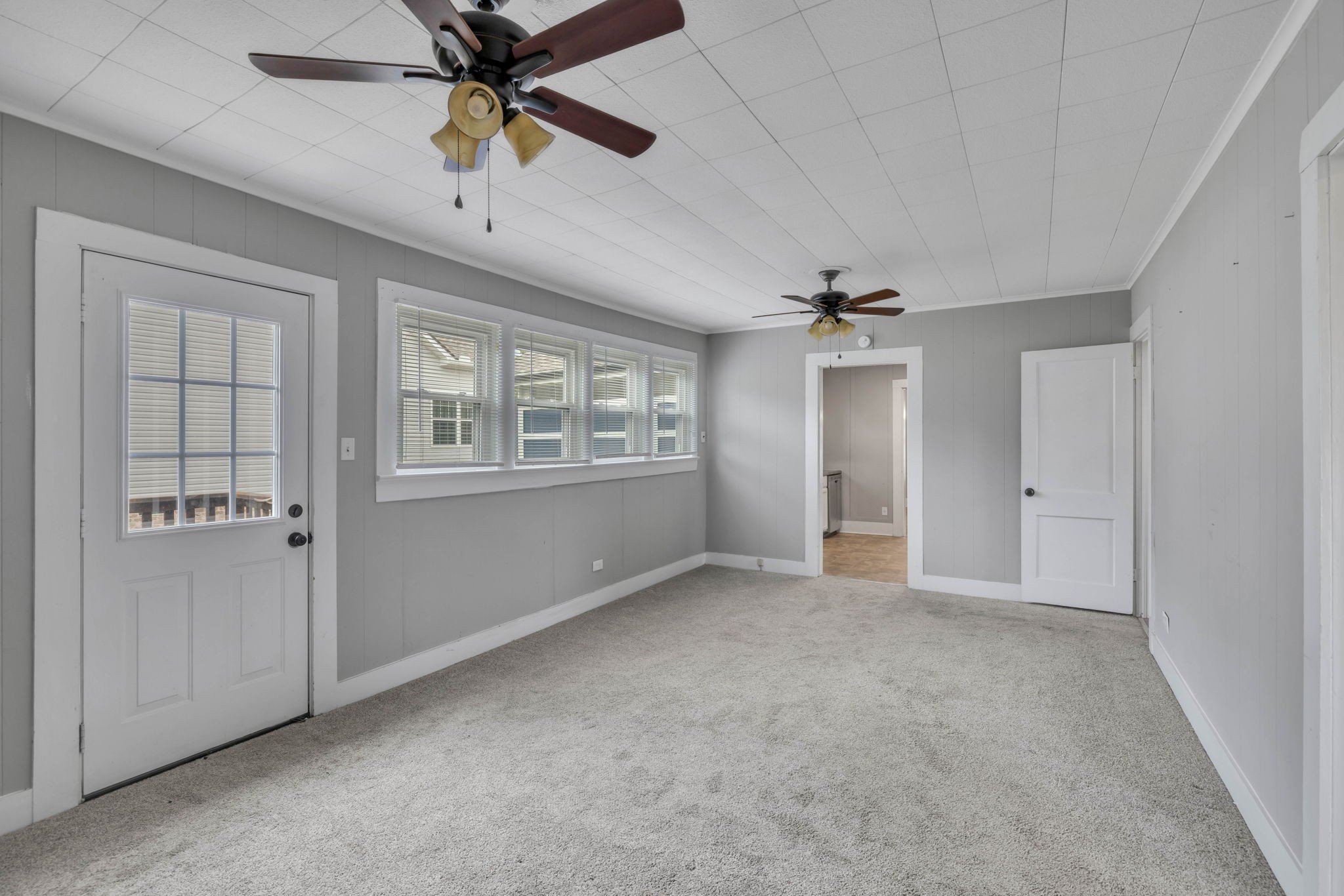 301 Maple Street Chapel Hill, TN 37034 - Photo 26 of 38 an empty room with chandelier fan and windows