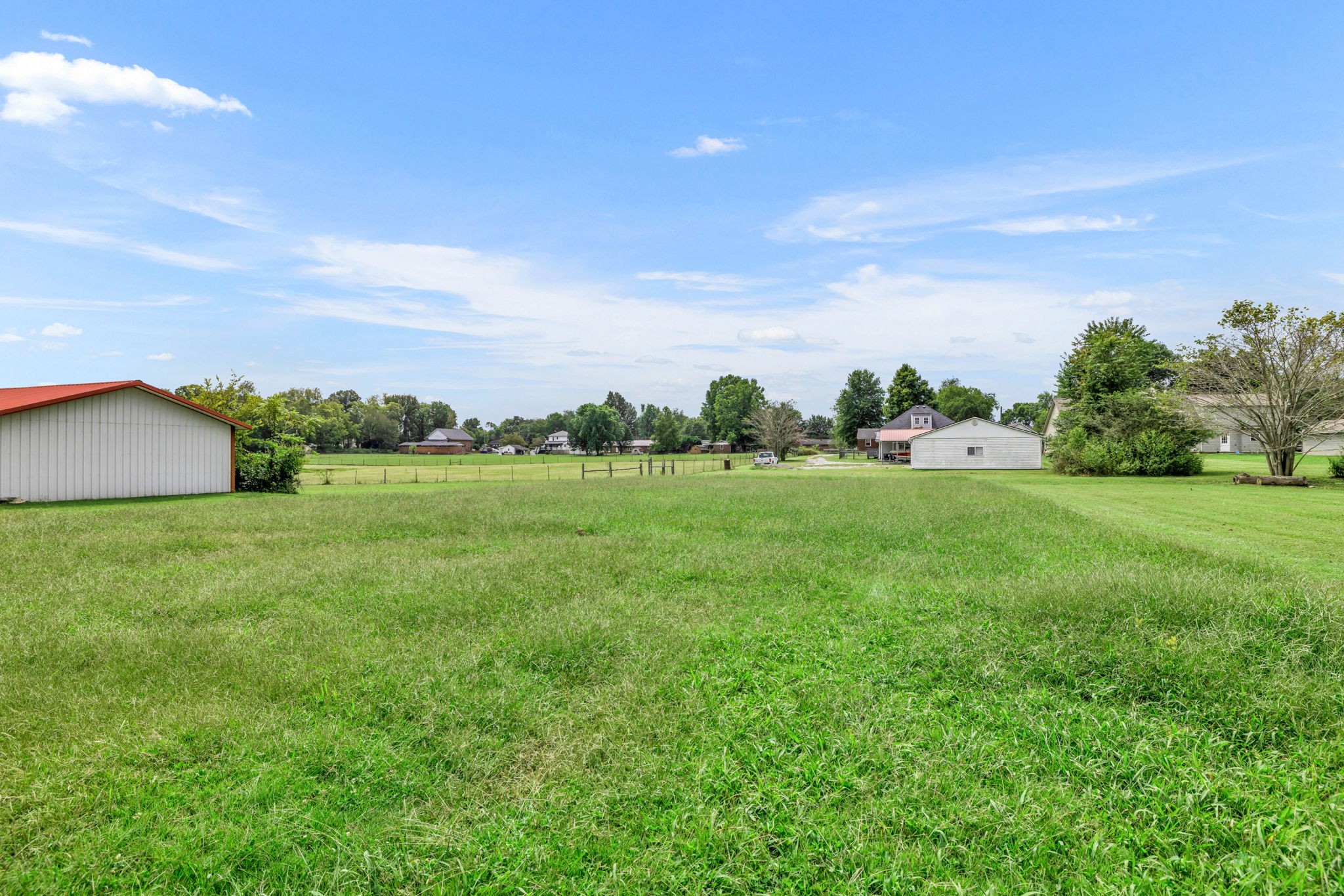 301 Maple Street Chapel Hill, TN 37034 - Photo 37 of 38 a view of a green field with wooden fence