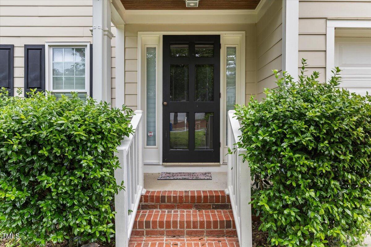 2408 Dahlgreen Road Raleigh, NC 27615 - Photo 4 of 61 front view of a house with a window