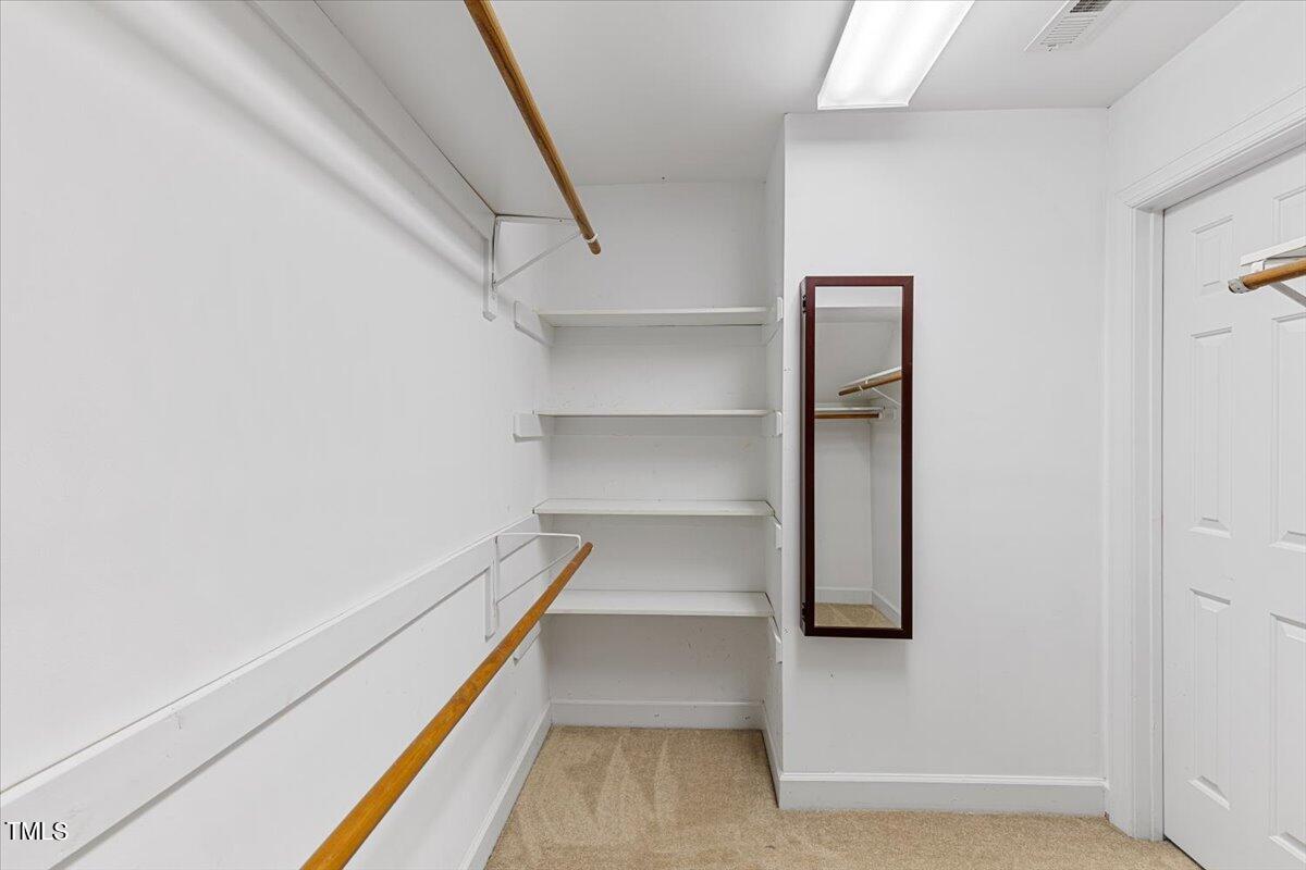 2408 Dahlgreen Road Raleigh, NC 27615 - Photo 41 of 61 a view of an empty walk in closet
