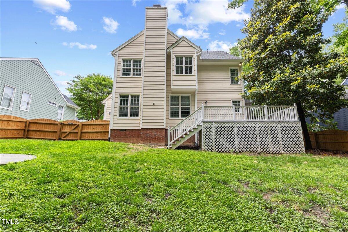 2408 Dahlgreen Road Raleigh, NC 27615 - Photo 55 of 61 a view of a house with a yard