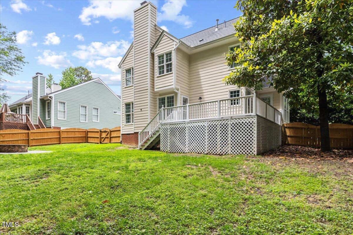 2408 Dahlgreen Road Raleigh, NC 27615 - Photo 56 of 61 a view of a house with a yard porch and sitting area