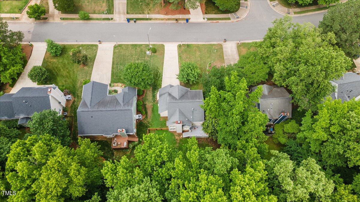 2408 Dahlgreen Road Raleigh, NC 27615 - Photo 61 of 61 an aerial view of a house with a yard and garden