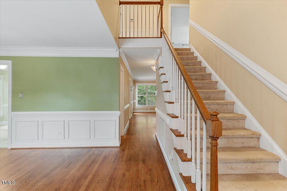 2408 Dahlgreen Road Raleigh, NC 27615 - Photo 9 of 61 a view of an entryway with wooden floor
