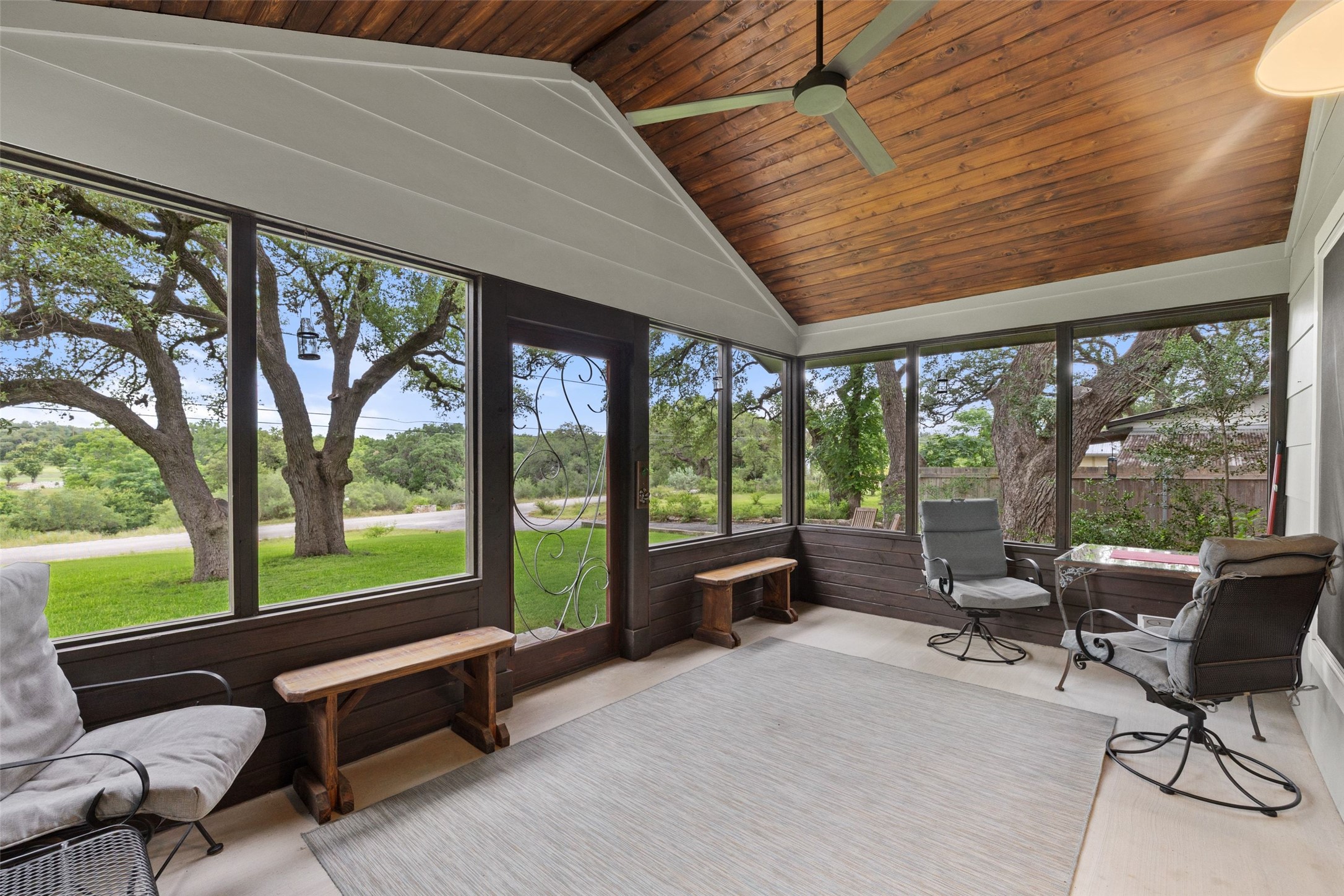 701 River Road Blanco, TX 78606 - Photo 26 of 38 a building outdoor seating with furniture and garden