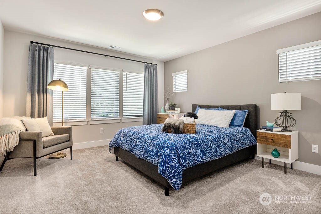 124 177th Street Southeast Bothell, WA 98012 - Photo 21 of 29 a bedroom with a bed and a couch