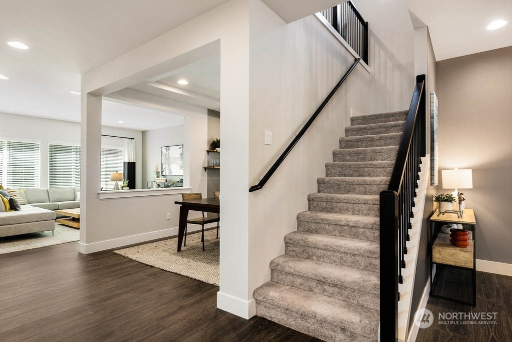 124 177th Street Southeast Bothell, WA 98012 - Photo 3 of 29 a view of entryway and hall with wooden floor