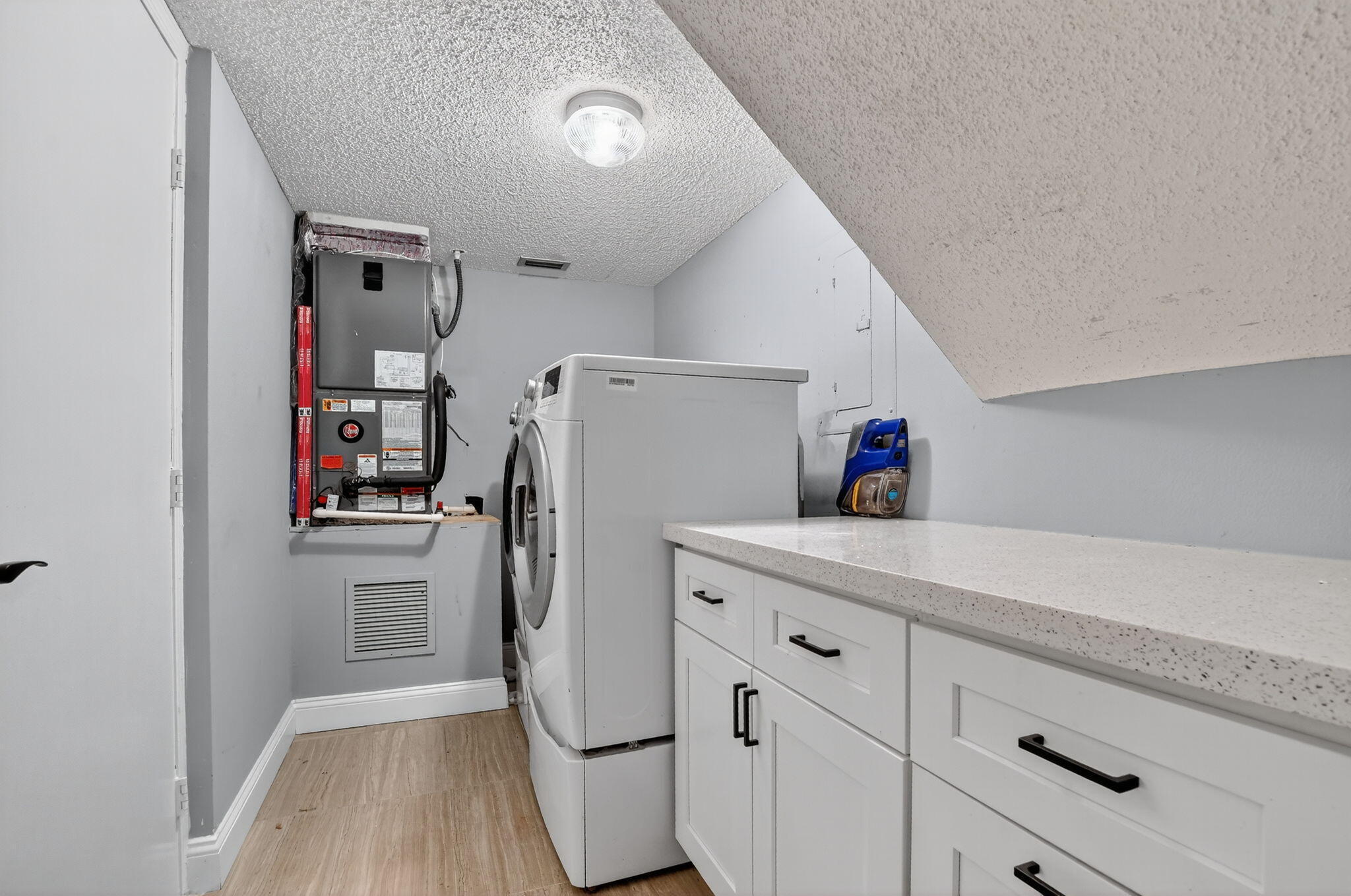 7773 La Mirada Drive Boca Raton, FL 33433 - Photo 17 of 39 Laundry room next to kitchen