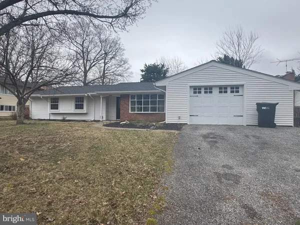 front view of a house with a dry yard