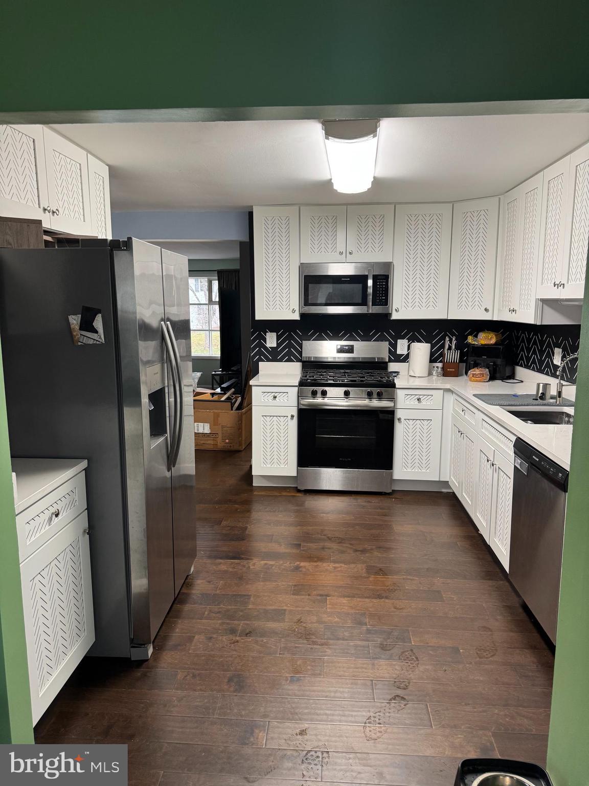 1508 Nicholas Road Waldorf, MD 20601 - Photo 11 of 36 a kitchen with stainless steel appliances granite countertop a refrigerator stove and sink