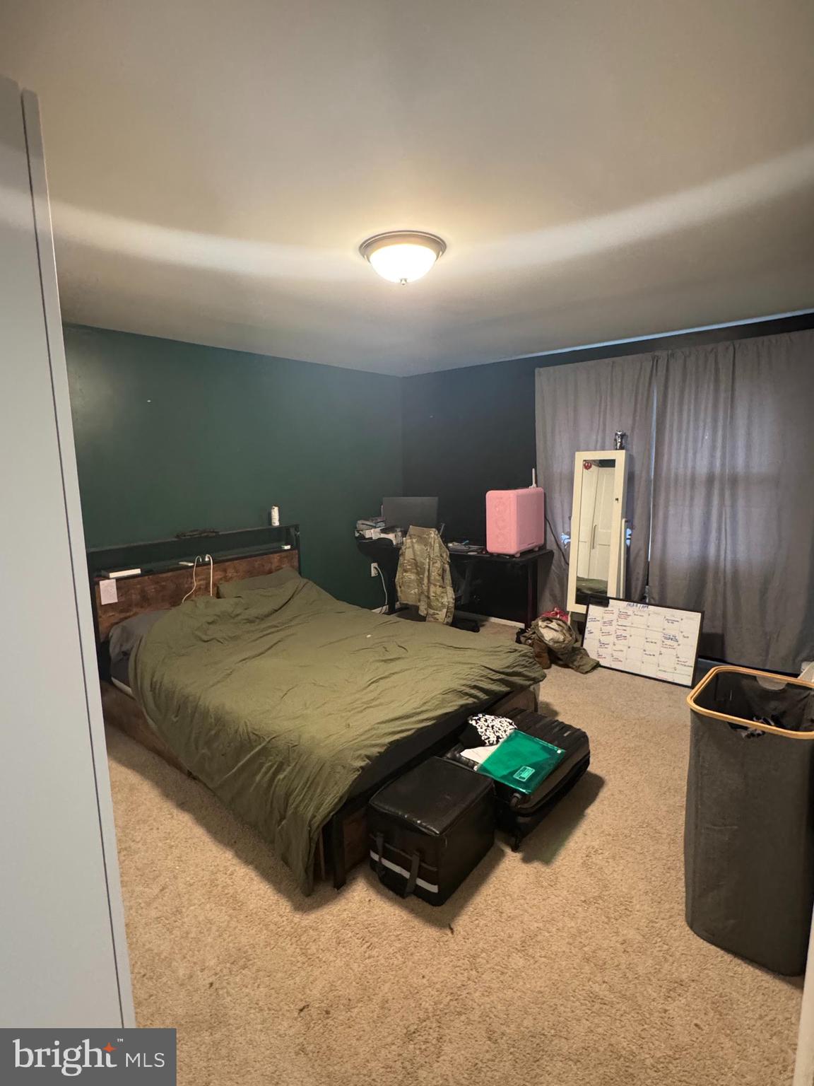 1508 Nicholas Road Waldorf, MD 20601 - Photo 24 of 36 a bedroom with bed and a chandelier