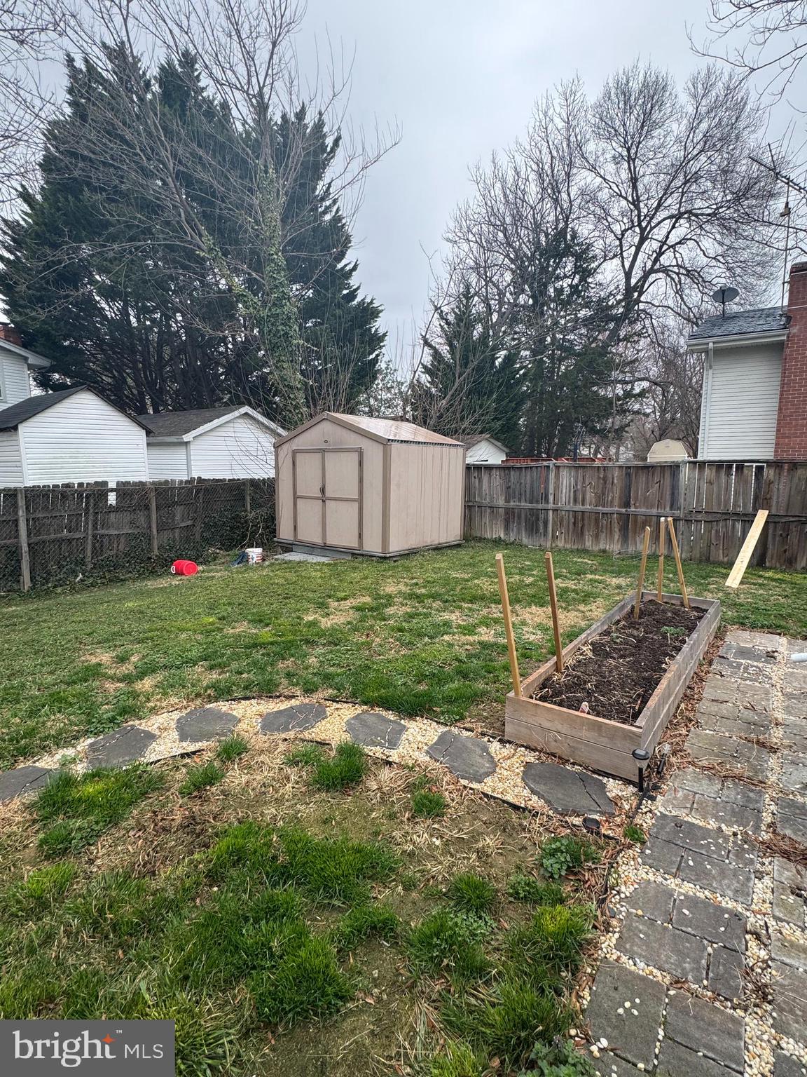 1508 Nicholas Road Waldorf, MD 20601 - Photo 32 of 36 a view of a backyard with a garden and trees