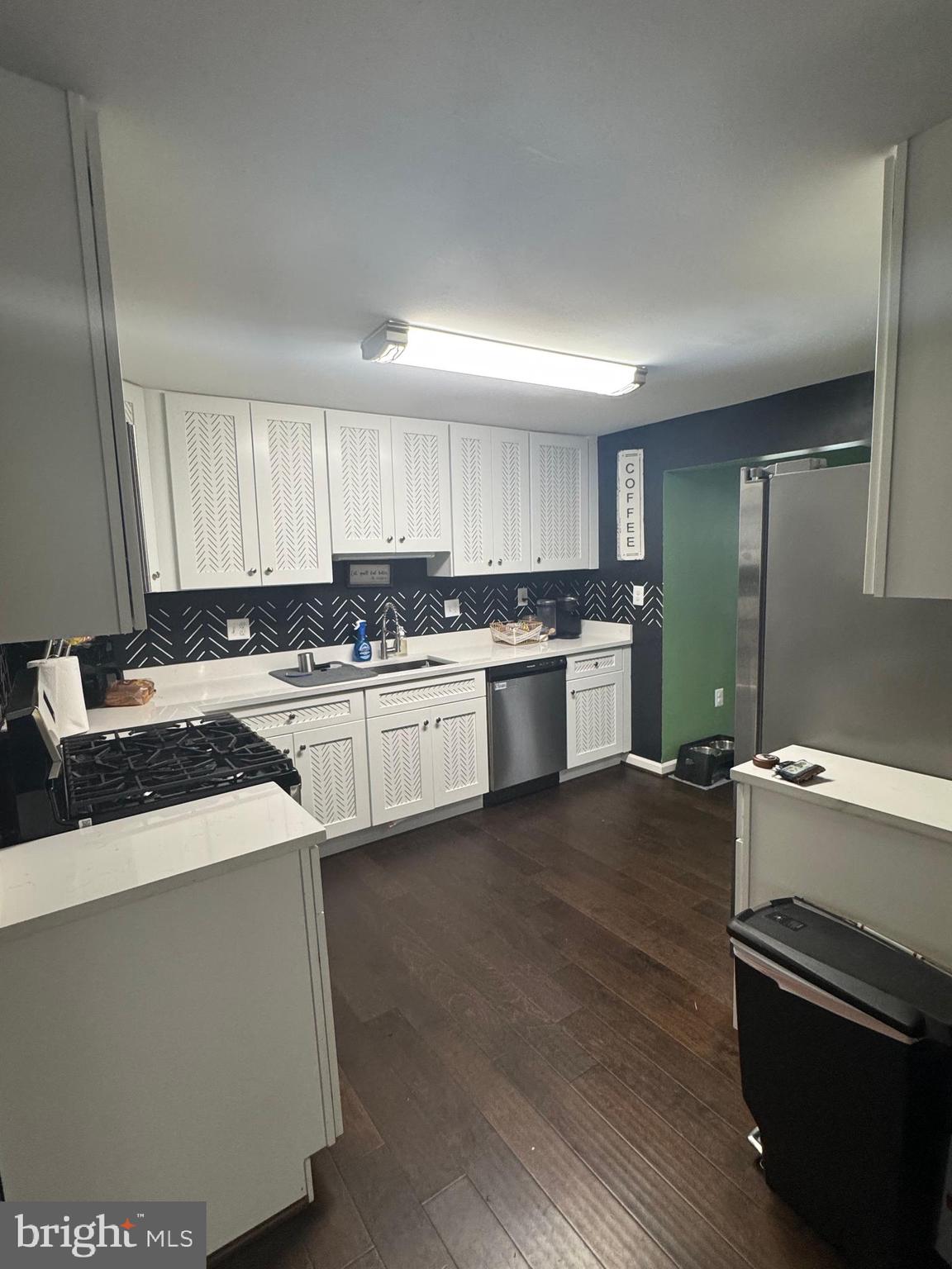 1508 Nicholas Road Waldorf, MD 20601 - Photo 10 of 36 a kitchen with a sink stove and cabinets