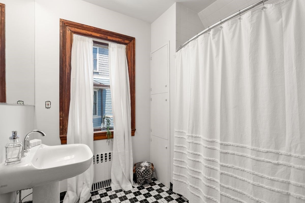 35 Langdon Street Cambridge, MA 02138 - Photo 12 of 35 a bathroom with a sink a toilet and shower