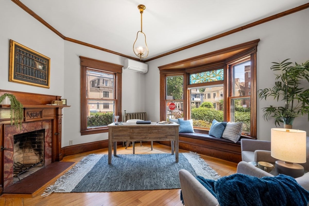 35 Langdon Street Cambridge, MA 02138 - Photo 15 of 35 a living room with furniture a window and a fireplace