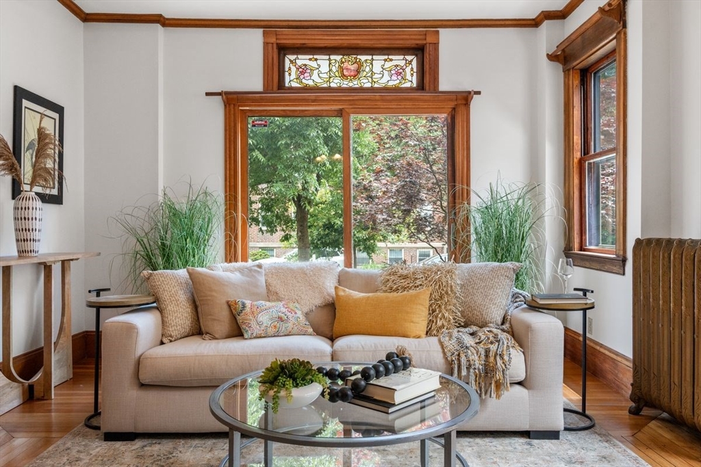 35 Langdon Street Cambridge, MA 02138 - Photo 16 of 35 a living room with furniture and a large window