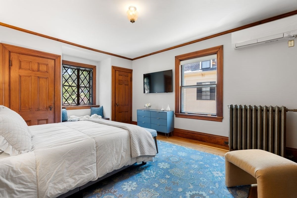 35 Langdon Street Cambridge, MA 02138 - Photo 20 of 35 a bedroom with a bed couch and a window