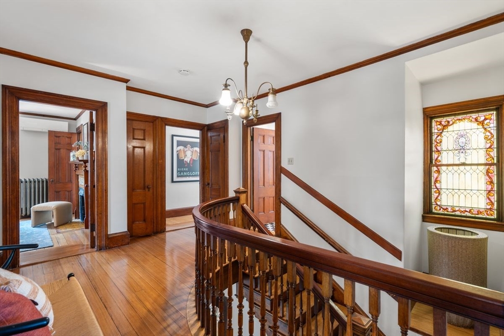 35 Langdon Street Cambridge, MA 02138 - Photo 23 of 35 a view of a hallway with furniture and windows