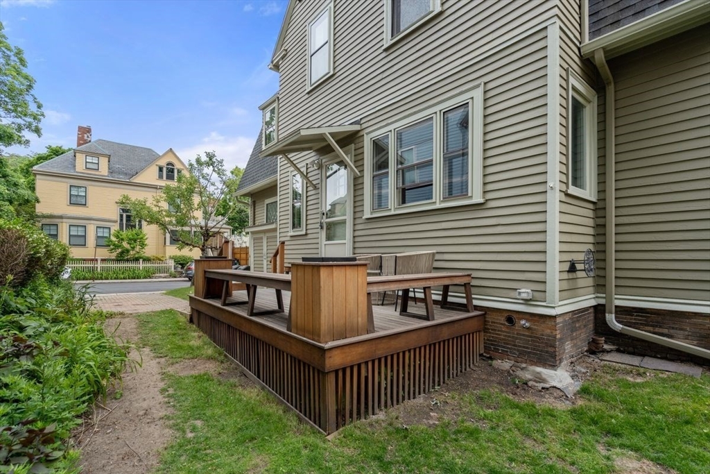 35 Langdon Street Cambridge, MA 02138 - Photo 31 of 35 a view of a house with backyard and sitting area