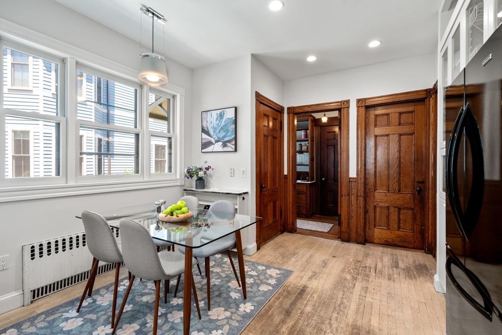 35 Langdon Street Cambridge, MA 02138 - Photo 8 of 35 a view of a dining room with furniture window and wooden floor