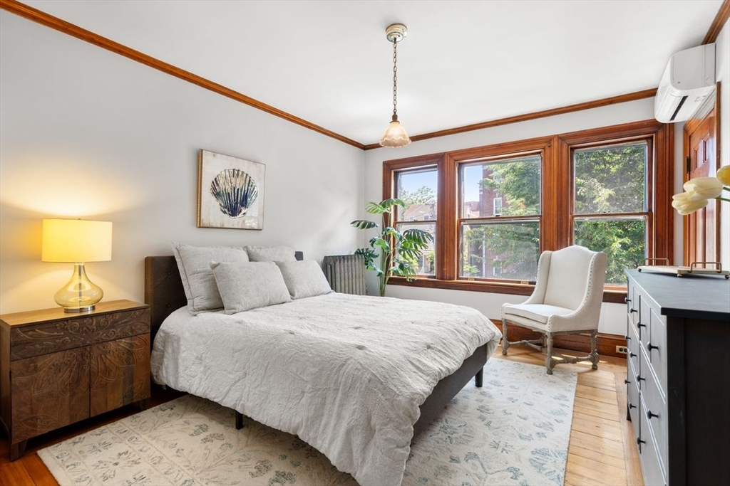 35 Langdon Street Cambridge, MA 02138 - Photo 10 of 35 a bedroom with a bed and a window