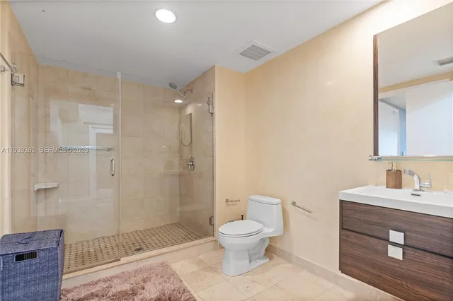 a view of balcony with furniture and city view