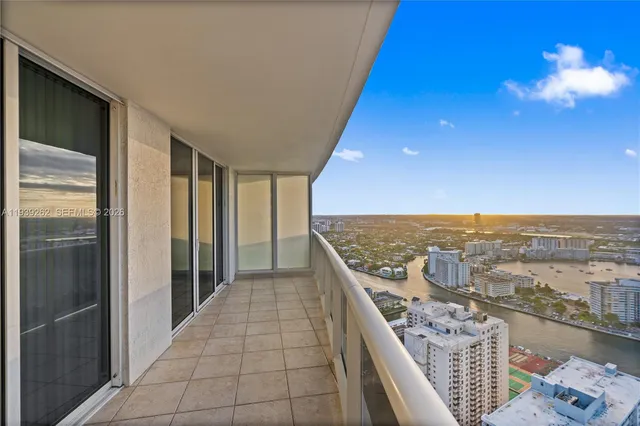 a patio with table and chairs