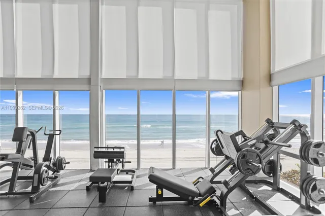 a bedroom with a bed and a mirror