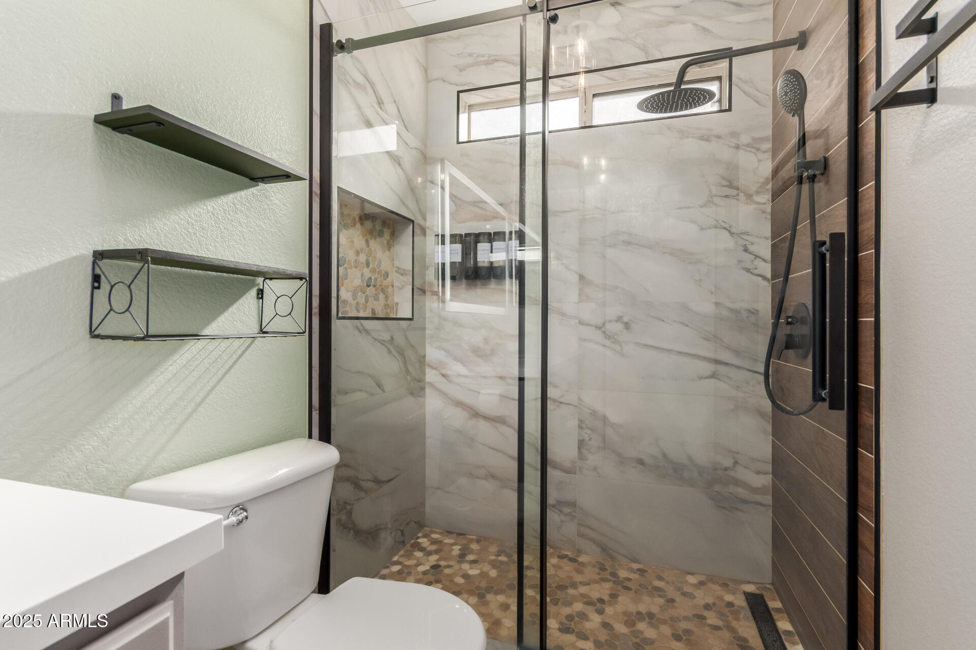 6932 South Russet Sky Way Gold Canyon, AZ 85118 - Photo 23 of 36 a bathroom with a toilet and a shower