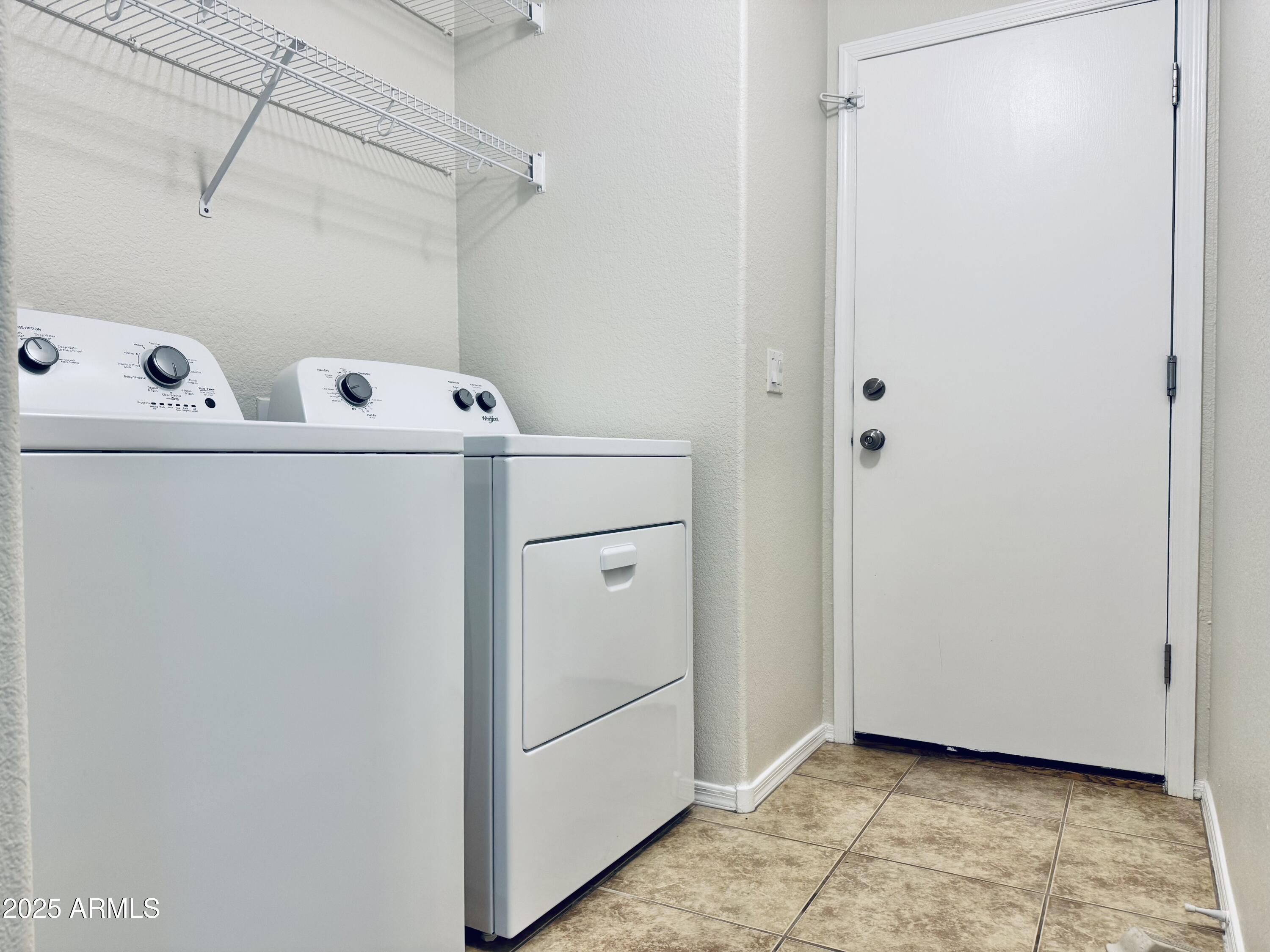 6932 South Russet Sky Way Gold Canyon, AZ 85118 - Photo 32 of 36 a utility room with dryer and washer